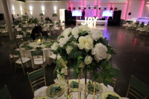 Wedding Reception, Wedding Venue, Full Bar, Amenities, Bride & Groom, Green and Gold color scheme, Tall centerpieces, white and cream flowers