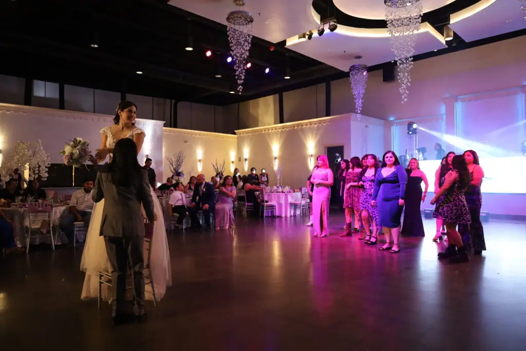 Beautifully decorated wedding ceremony setup in a ballroom at DFW Celebrations, featuring elegant decor and seating arrangements. Perfect for private events in a premier event venue and banquet hall