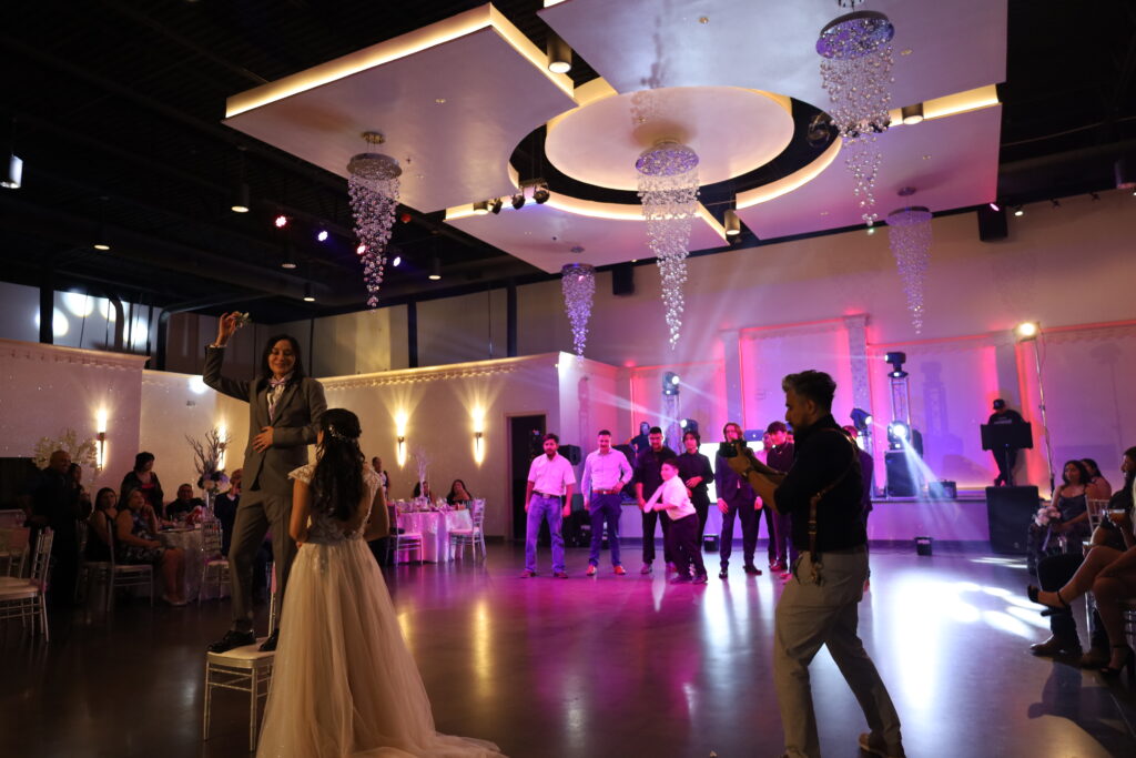 Beautifully decorated wedding ceremony setup in a ballroom at DFW Celebrations, featuring elegant decor and seating arrangements. Perfect for private events in a premier event venue and banquet hall