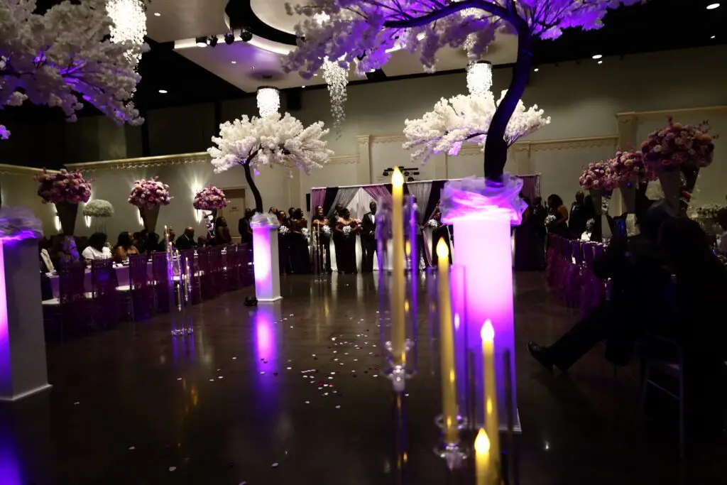 Beautifully decorated wedding ceremony setup in a ballroom at DFW Celebrations, featuring elegant decor and seating arrangements. Perfect for private events in a premier event venue and banquet hall