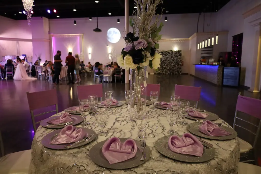 Projector Casting a Stunning Moon on the Banquet Hall Wall - Elegant Event Lighting