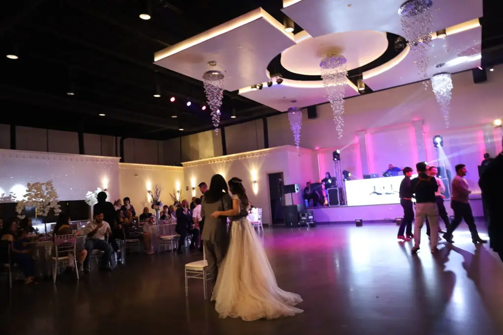 Beautifully decorated wedding ceremony setup in a ballroom at DFW Celebrations, featuring elegant decor and seating arrangements. Perfect for private events in a premier event venue and banquet hall.