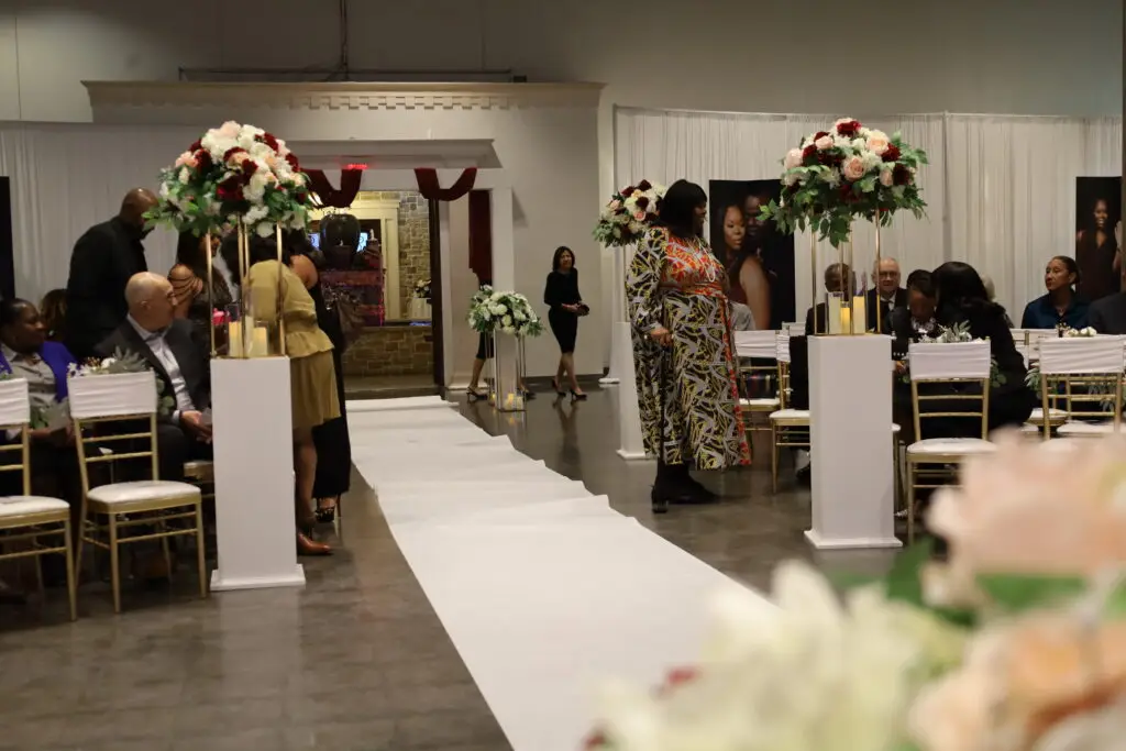 Beautifully decorated wedding ceremony setup in a ballroom at DFW Celebrations, featuring elegant decor and seating arrangements. Perfect for private events in a premier event venue and banquet hall