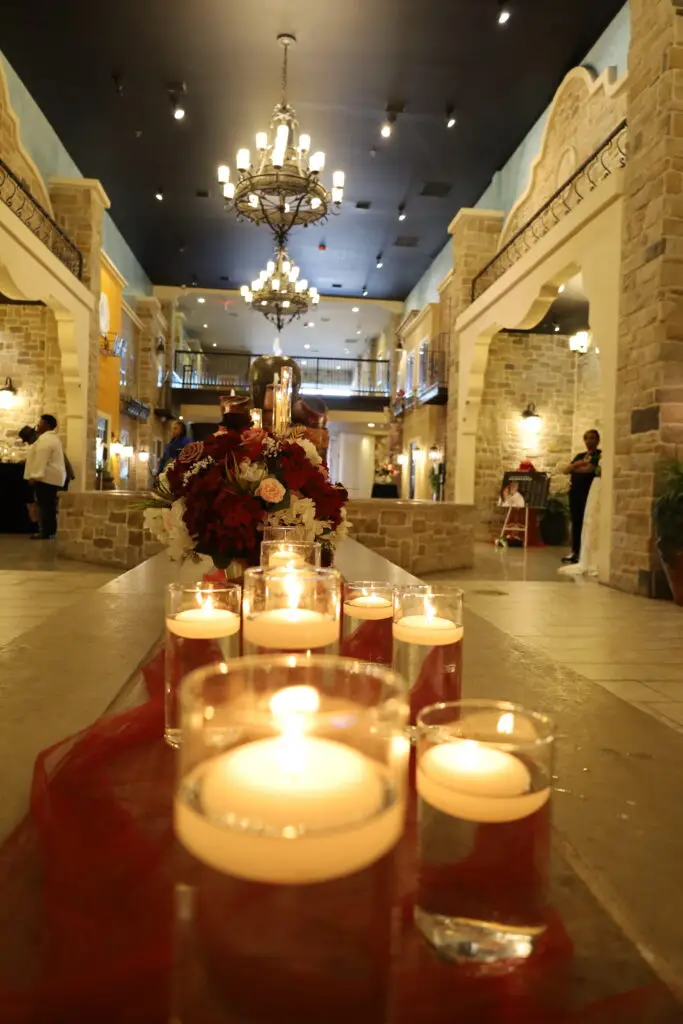 Beautifully decorated wedding ceremony setup in a ballroom at DFW Celebrations, featuring elegant decor and seating arrangements. Perfect for private events in a premier event venue and banquet hall.